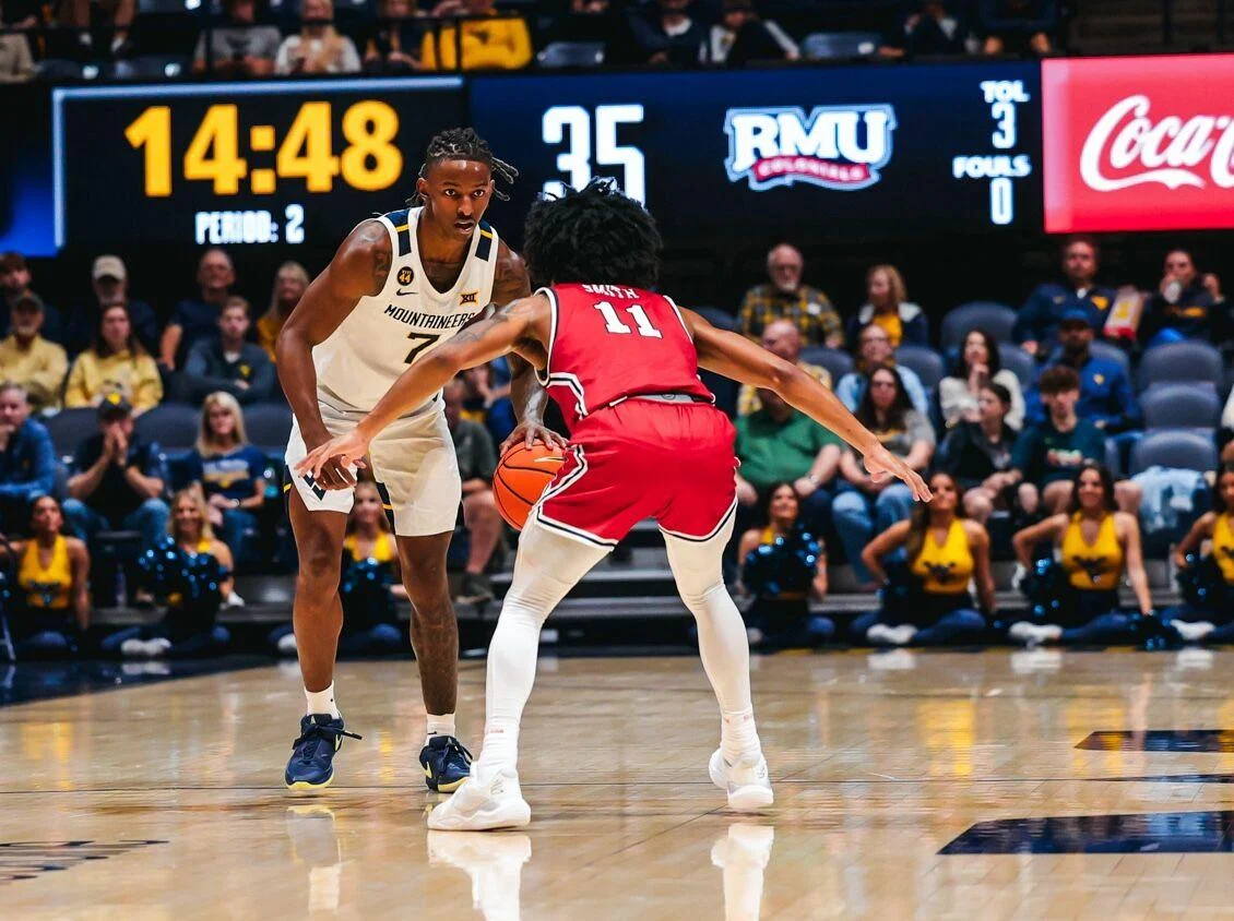 Javon Small handling the ball against Robert Morris