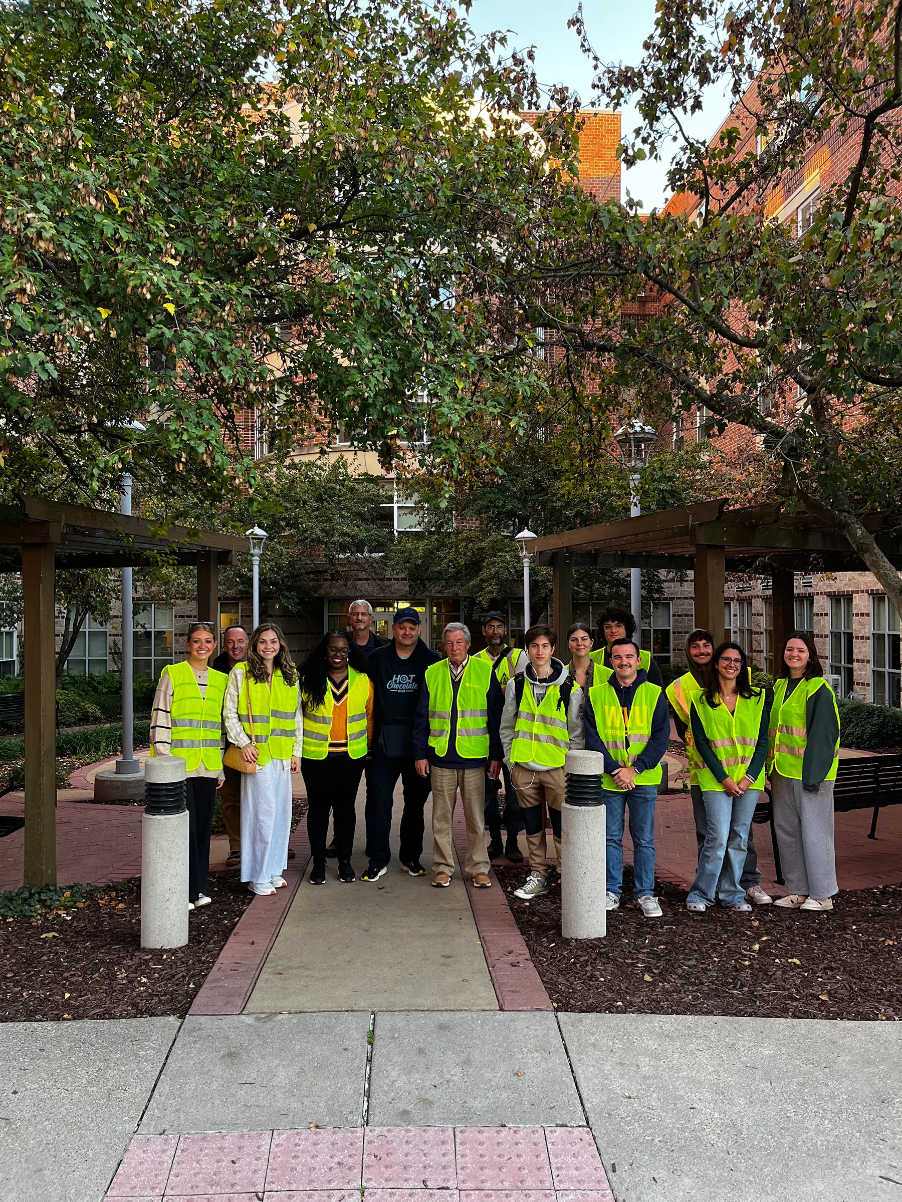 SGA students wearing pedestrian vests at a Safety Walk